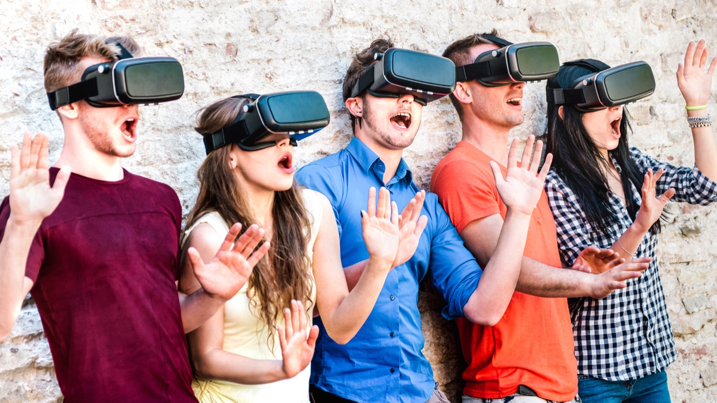 A group of friends using VR headsets
